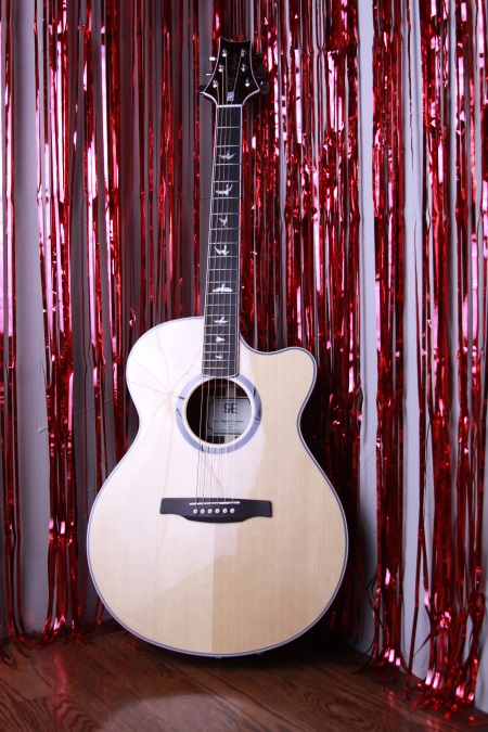With a street price of $859, the PRS SE Angelus Custom Cutaway acoustic-electric is one of the best guitars in this price range on the current market.