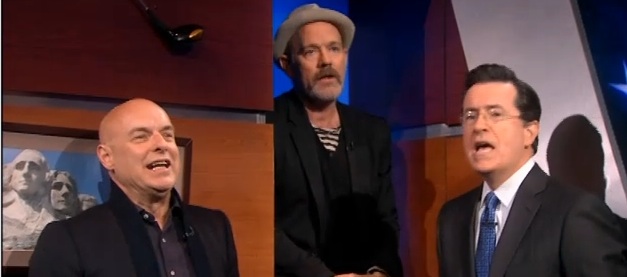 Watch Michael Stipe, Brian Eno, and Stephen Colbert Sing “Lean On Me”
