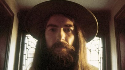 George Harrison is photographed wearing a wide brim hat around the time he released 'All Things Must Pass.'