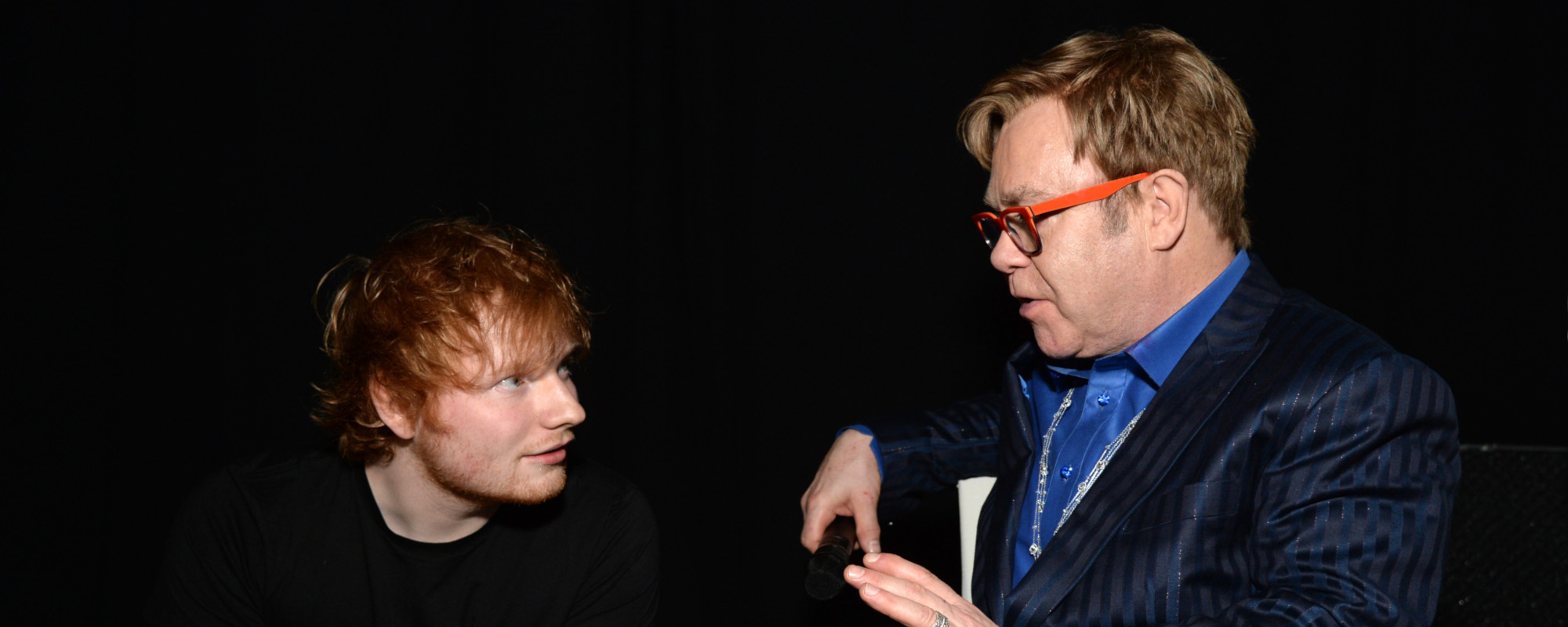 Watch: Elton John and Ed Sheeran Take In Soccer Match, Exchange Christmas Gifts