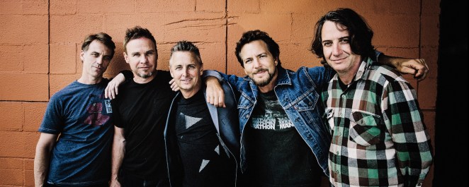 The band Pearl Jam is pictured all together with Eddie Vedder.