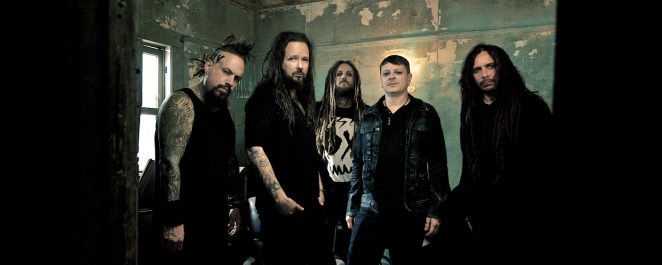 The nu metal band Korn is pictured together.
