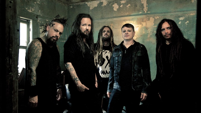 The nu metal band Korn is pictured together.