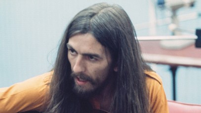 George Harrison playing the guitar around the time he released 'All Things Must Pass.'