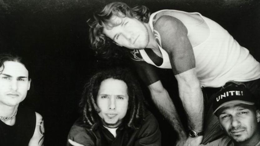 The band Rage Against The Machine is pictured together around the time "Bulls On Parade" was released.