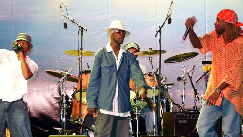 The Baha Men, the band who famously sings "Who Let the Dogs Out," is pictured performing live.