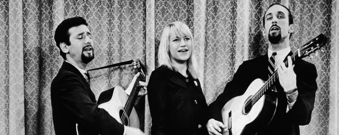 Peter, Paul and Mary sing and perform "Puff The Magic Dragon" together.