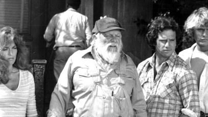A photo of the characters from the show 'The Dukes of Hazzard' appears in black and white. The show was soundtracked by the song "Good Ol' Boys" by Waylon Jennings.
