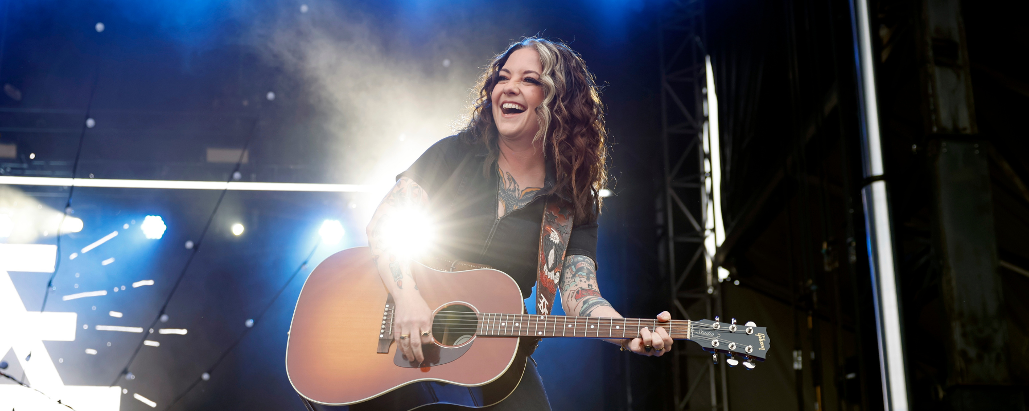 Behind the Meaning of Ashley McBryde’s Heartwarming “Light On In The Kitchen”