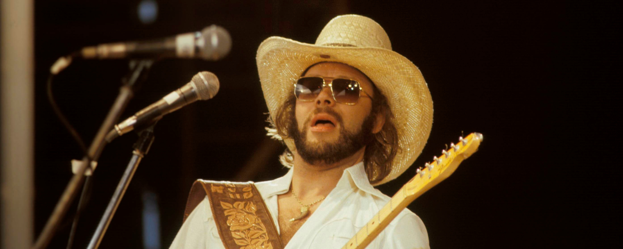 The Meaning Behind the Tongue-in-Cheek “Family Tradition” by Hank Williams Jr.