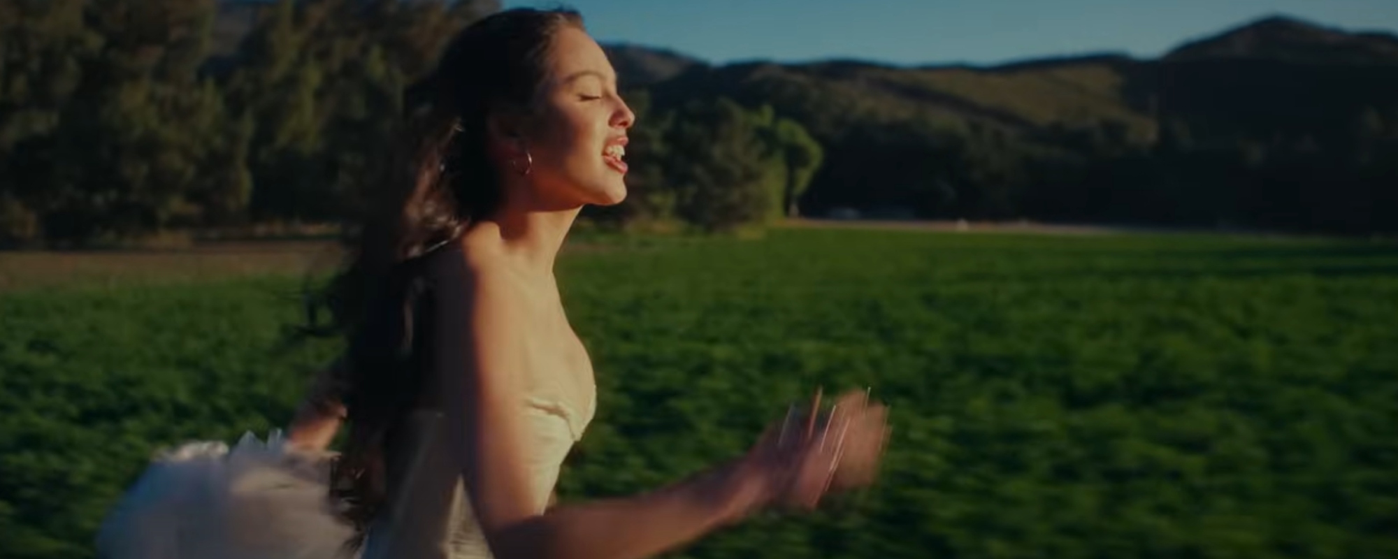 Watch: Olivia Rodrigo Releases Video for New Song “Can’t Catch Me Now” from ‘The Hunger Games’