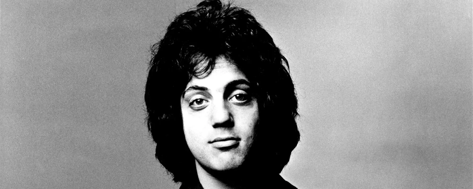 Billy Joel Recalls the “Odd Situation” That Inspired His Breakout Hit “Piano Man”