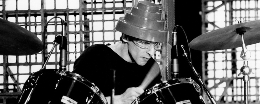 Behind the Band Name Devo American Songwriter