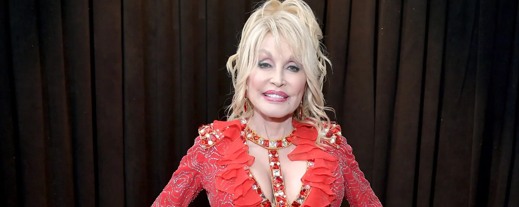 Look: Dolly Parton Shares Her Passion for Christmas Fashion With Festive Throwback Photos
