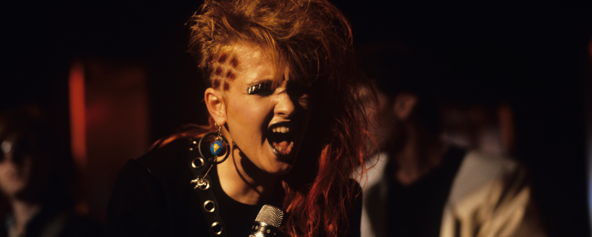 The Real Meaning Behind Cyndi Lauper’s Saucy Self-Love Serenade, “She Bop”