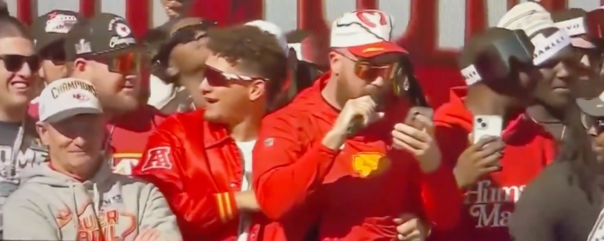 Patrick Mahomes Has to Rescue Travis Kelce from Drunken Garth Brooks Rendition at Chiefs Super Bowl Parade