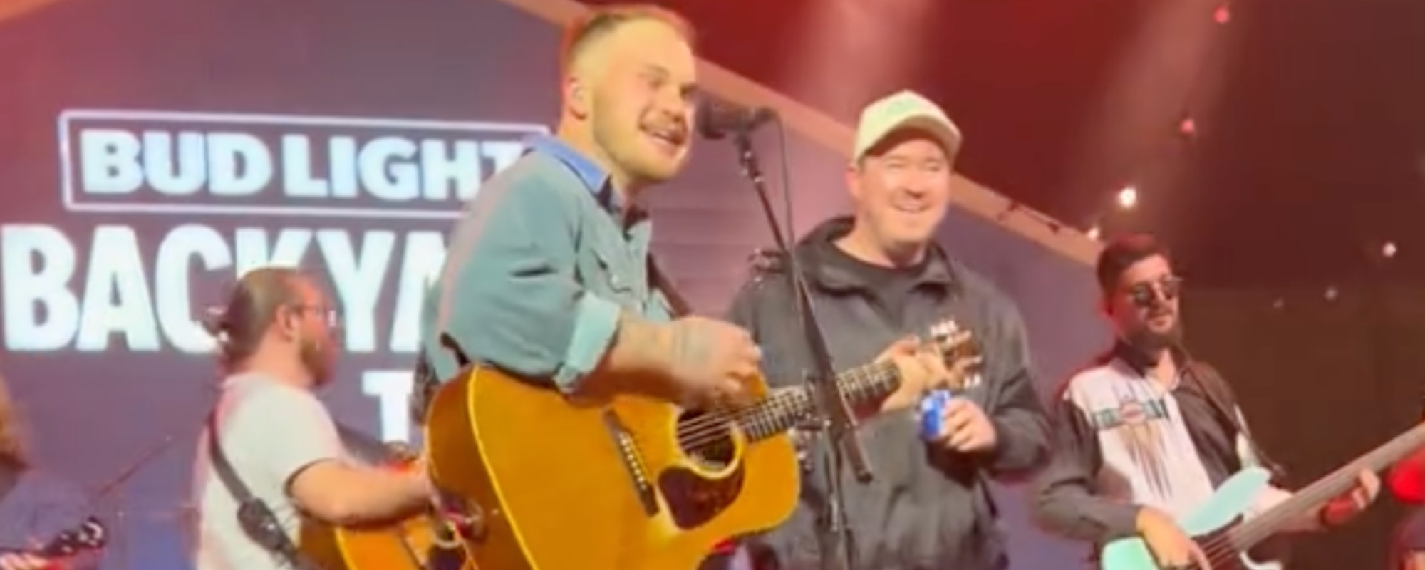 Watch Shane Gillis Join Zach Bryan for Perfectly Awkward “Revival” Performance