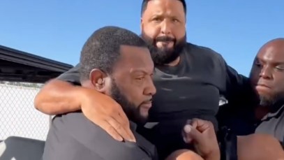 DJ carried by security