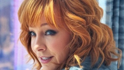 Reba McEntire is Super Bowl ready, sporting boots with the fur.