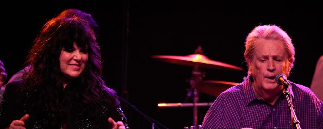 Brian Wilson and Ann Wilson perform together at a 2014 George Harrison celebration.