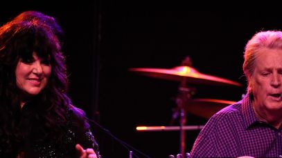 Brian Wilson and Ann Wilson perform together at a 2014 George Harrison celebration.