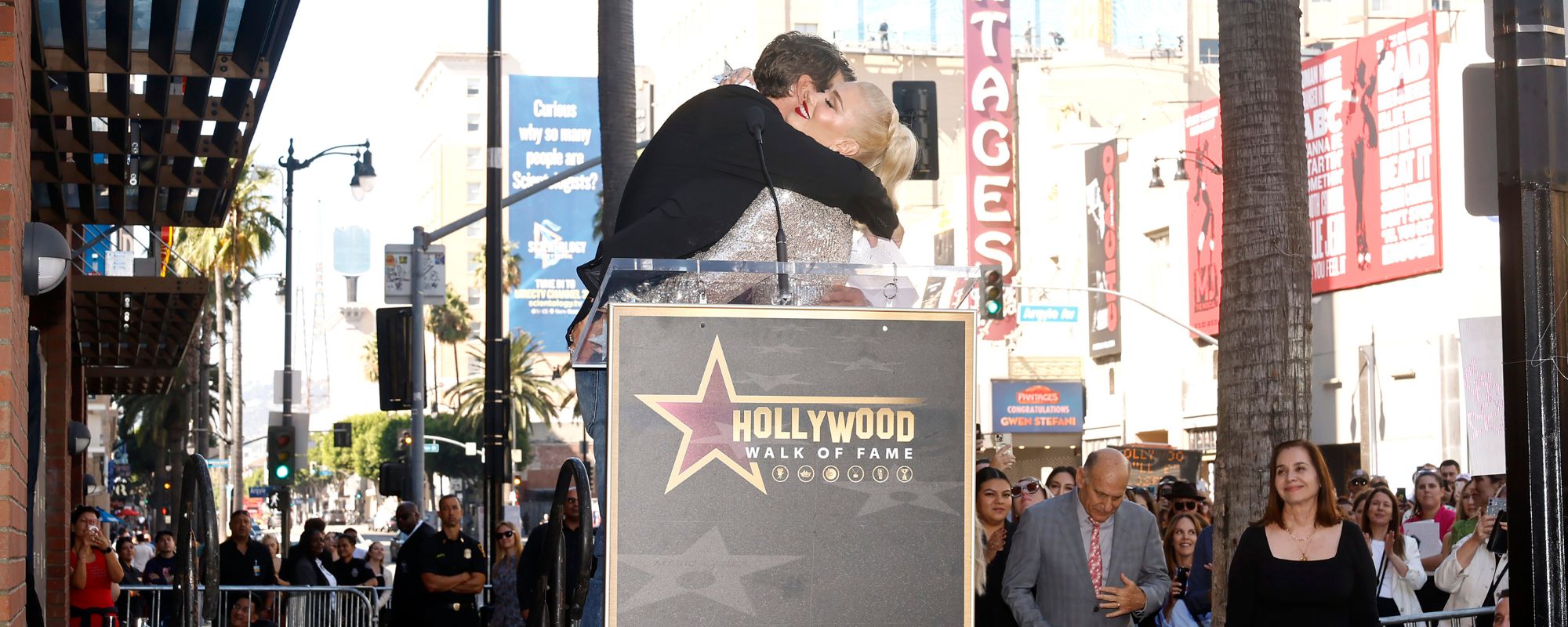 Blake Shelton and Gwen Stefani hugging during Stefani's Hollywood Walk of Fame Star ceremony in October 2023.