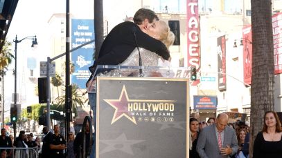 Blake Shelton and Gwen Stefani hugging during Stefani's Hollywood Walk of Fame Star ceremony in October 2023.