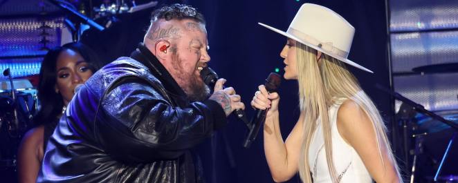 Jelly Roll and Lainey Wilson perform onstage during the 66th GRAMMY Awards Pre-GRAMMY Gala & GRAMMY Salute to Industry Icons Honoring Jon Platt at The Beverly Hilton on February 03, 2024 in Beverly Hills, California.