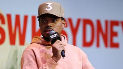Chance the Rapper sports a pink hoodie and his signature "3" ballcap at SXSW Sydney in October 2023.