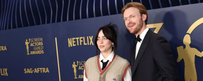 Billie Eilish with older brother Finneas O'Connell at the 2024 SAG Awards.
