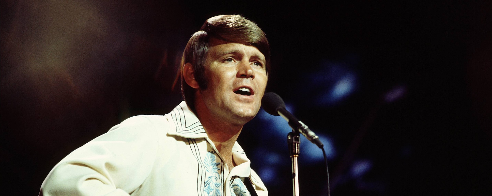 The Hustles of Country Stardom and the Meaning Behind Glen Campbell’s 1975 Hit “Rhinestone Cowboy”