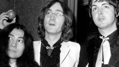 Yoko Ono, John Lennon, Paul McCartney stand side by side