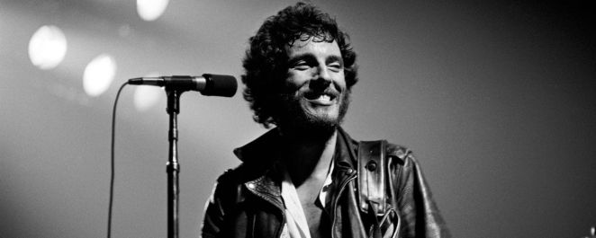 Young Bruce Springsteen smiling