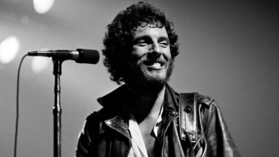Young Bruce Springsteen smiling