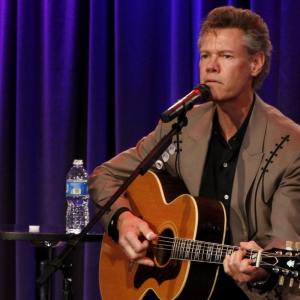 Randy Travis who had a No. 1 hit with a Larry Henley song