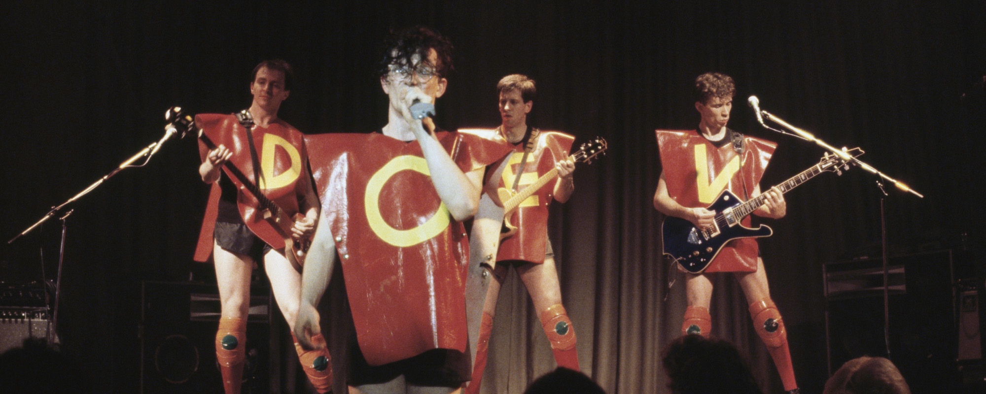 The Stories Behind 4 Distinctly Different Versions of Devo’s “Beautiful World”