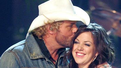Toby Keith and his daughter Krystal perform on stage at the 38th Annual CMA Awards at the Grand Ole Opry House November 9, 2004 in Nashville, Tennessee.