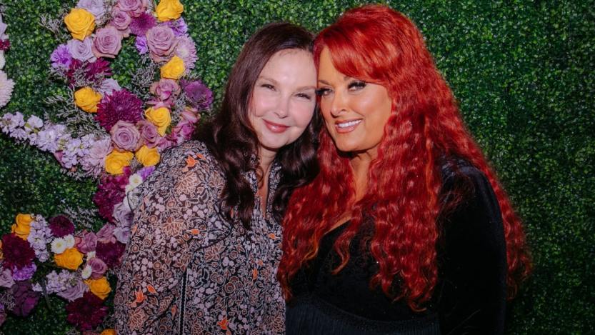Ashley Judd and Wynonna Judd seen backstage for CMT Coal Miner's Daughter: A Celebration of the Life & Music of Loretta Lynn at Grand Ole Opry on October 30, 2022 in Nashville, Tennessee.