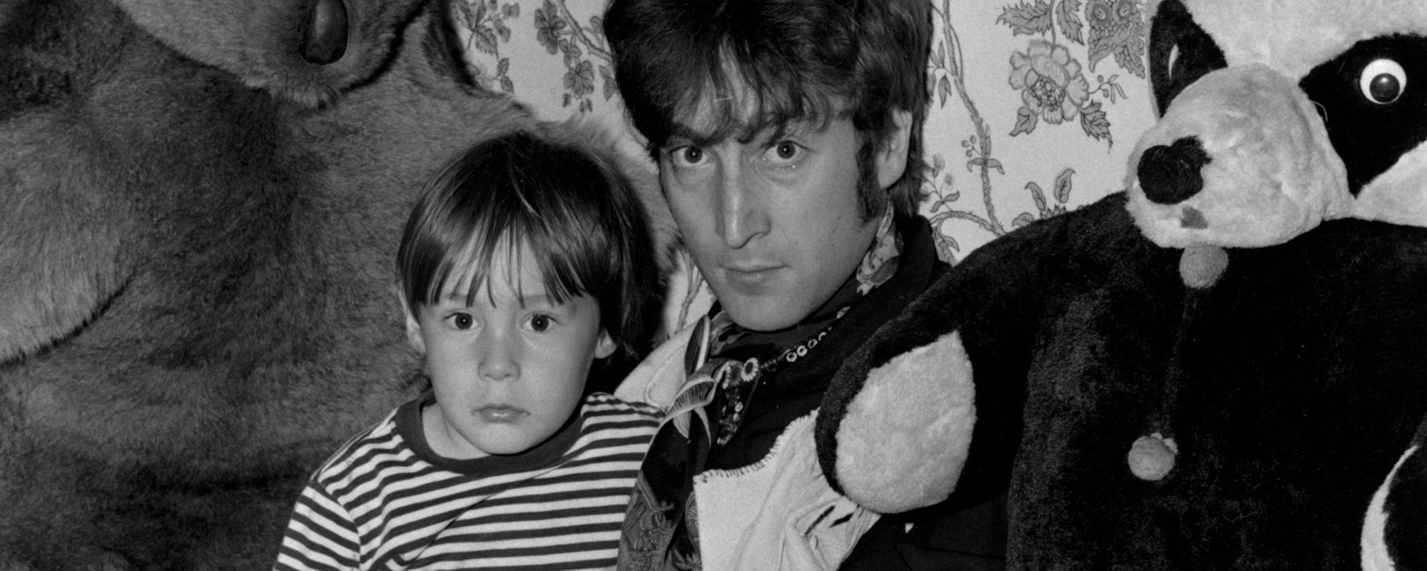 Julian Lennon sits in John Lennon's lap