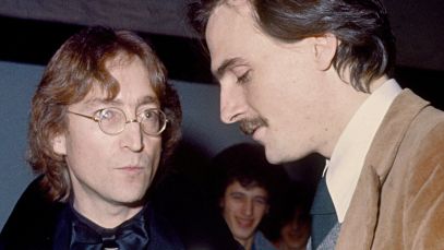 John Lennon and James Taylor speaking to one another