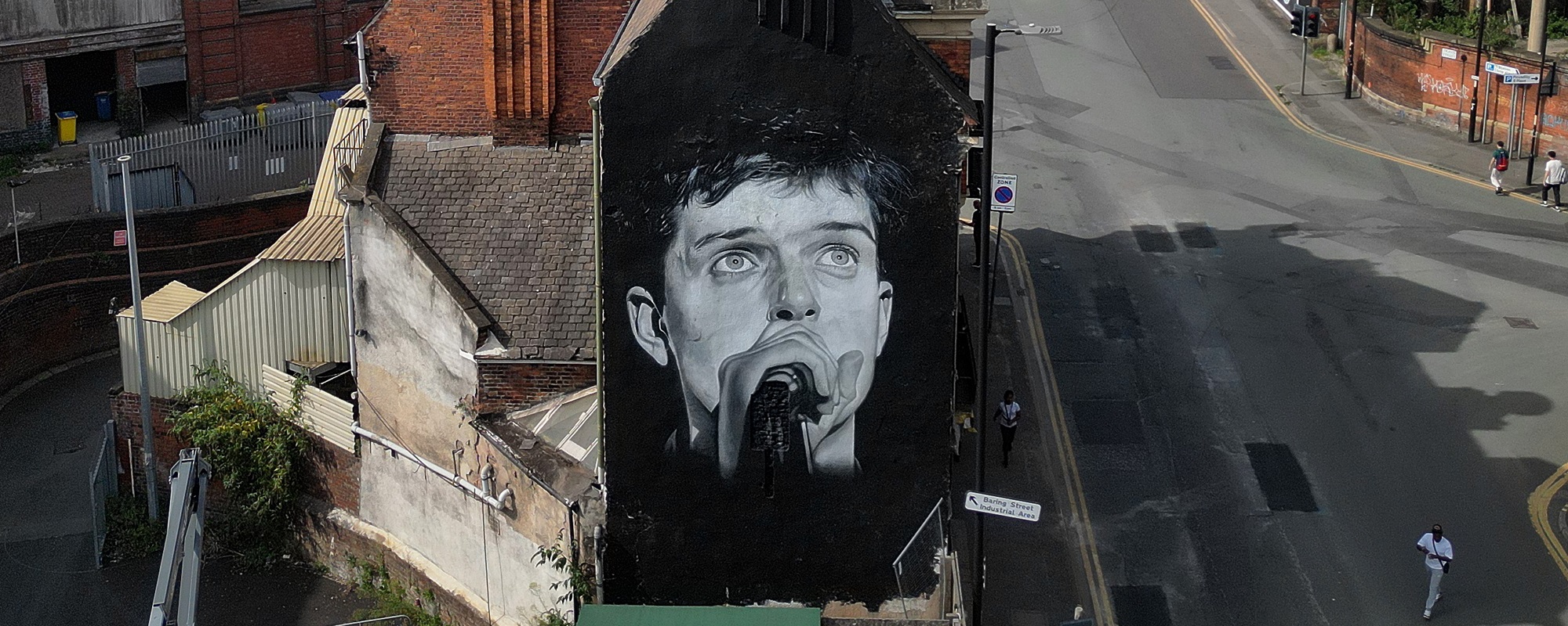 Restored Ian Curtis Mural Unveiled In Manchester