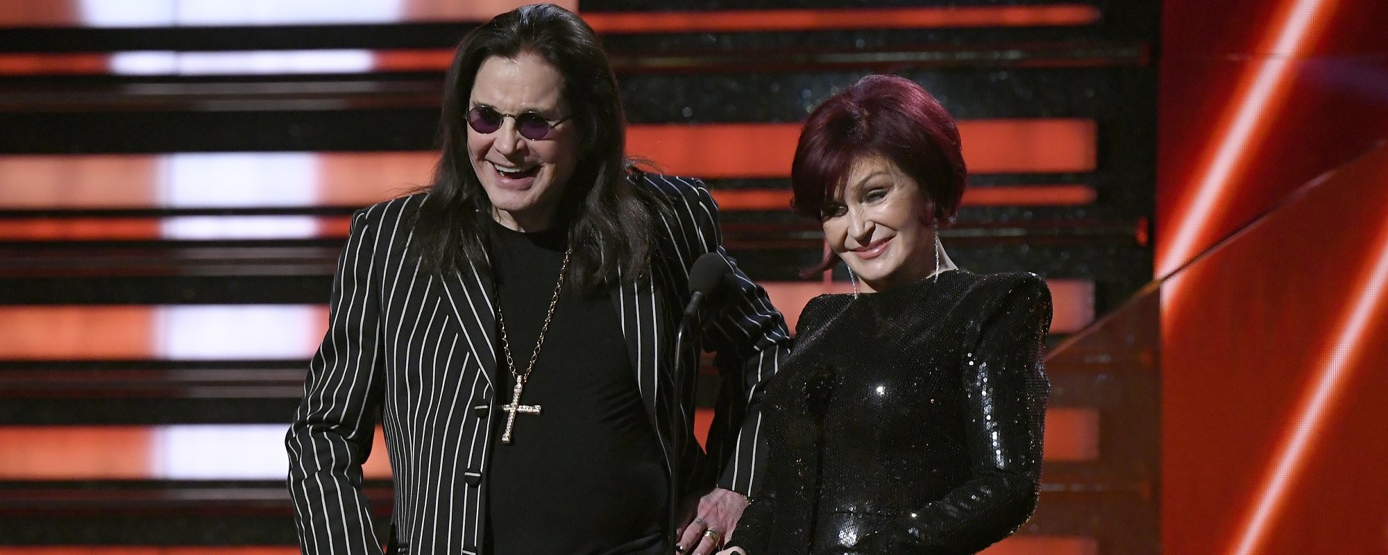 Ozzy Osbourne’s Wife Explains Why Their Planned Return to the U.K. Has Been Delayed; Source Claims Ozzy’s Unsure About the Move