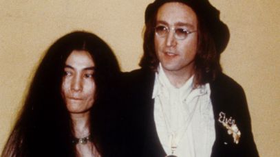 Yoko Ono and John Lennon stand together