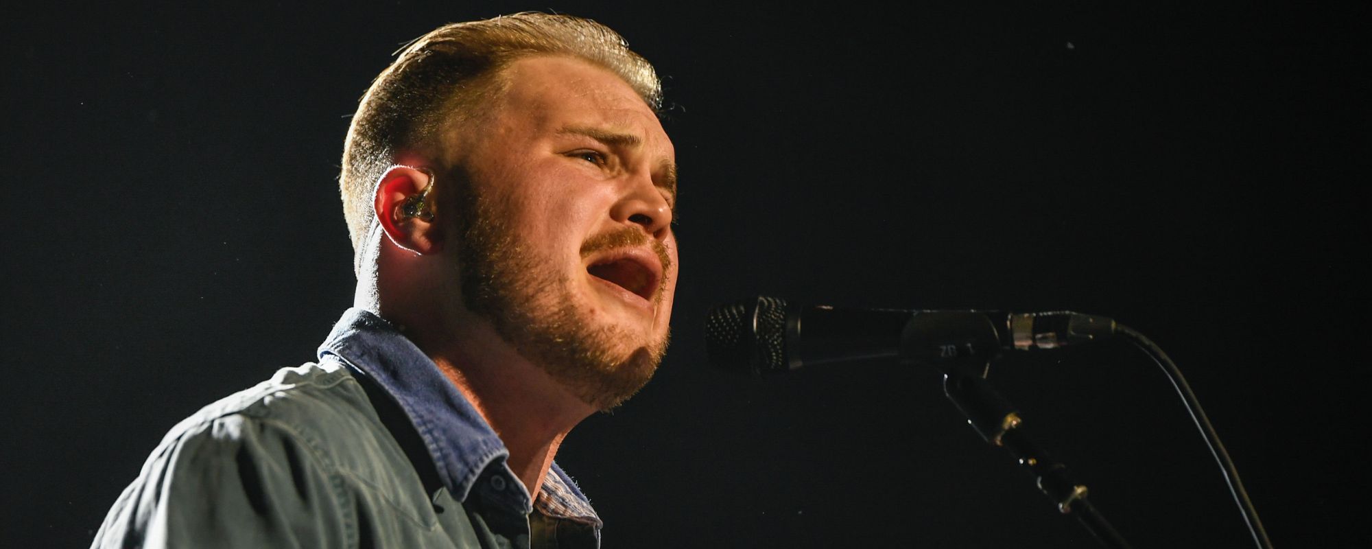 Zach Bryan Stops Mid-Set to Swat "Whole A-- Spider" Crawling On Him