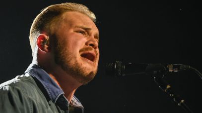 Zach Bryan Stops Mid-Set to Swat "Whole A-- Spider" Crawling On Him