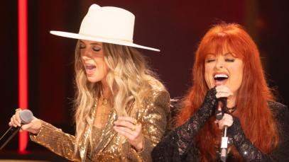 Lainey Wilson and Wynonna Judd performing at the Grand Ole Opry