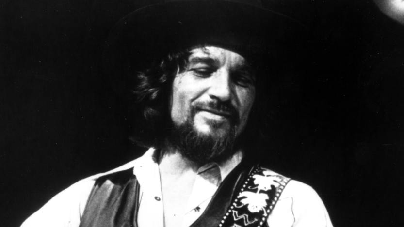Waylon Jennings performs onstage wearing a cowboy hat with a Fender Telecaster electric guitar on June 2, 1983 in Los Angeles, California.
