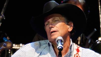 George Strait performs during Playin' Possum! The Final No Show Tribute To George Jones - Show at Bridgestone Arena on November 22, 2013 in Nashville, Tennessee.