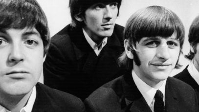 Paul McCartney, George Harrison, Ringo Starr, and John Lennon pose for photo in 1966