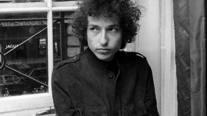 Young Bob Dylan looking to the right
